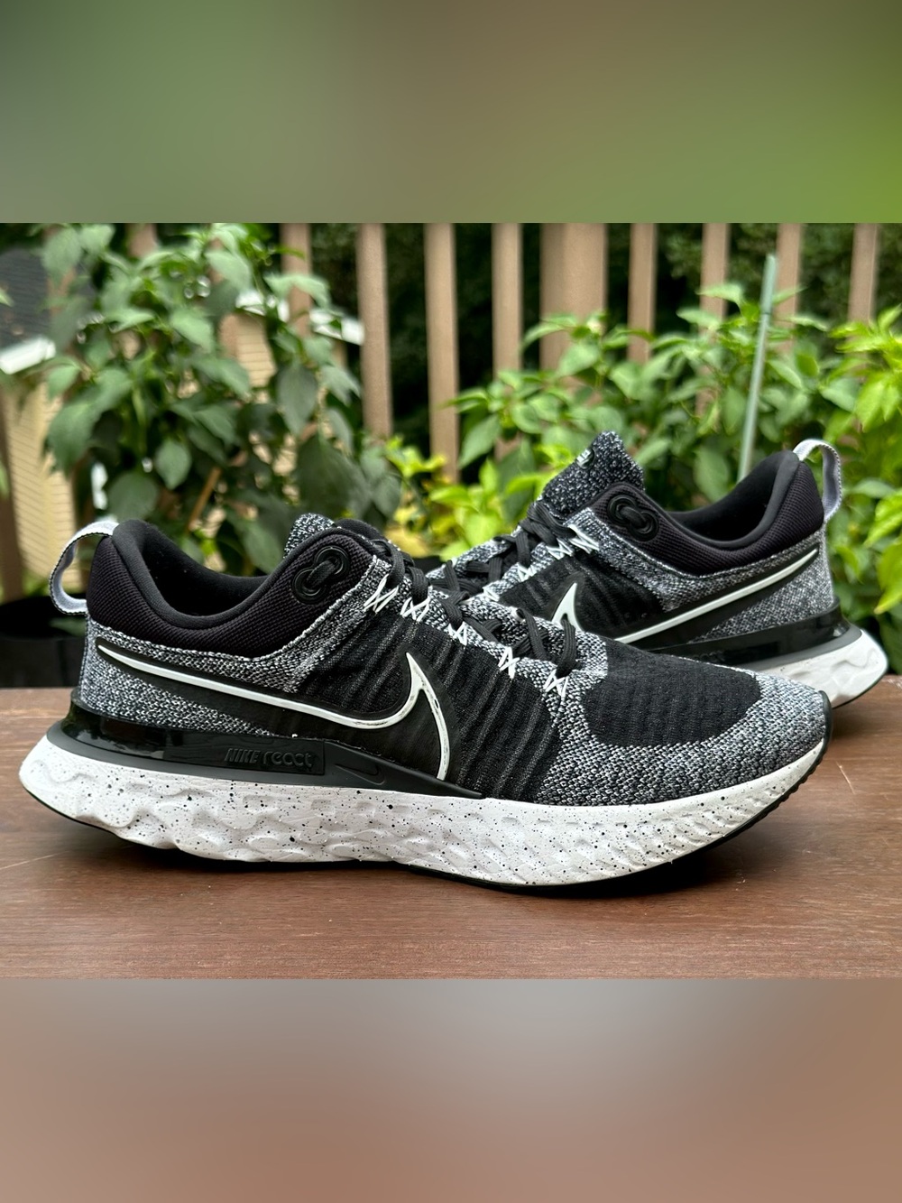 Nike Men’s Black and White Flyknit Athletic Shoes